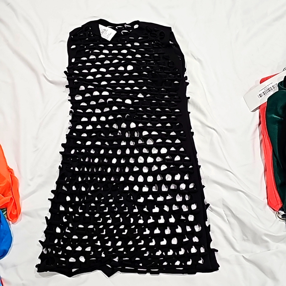 Black swim cover up laser cup holes. Size Small. Never worn brand new